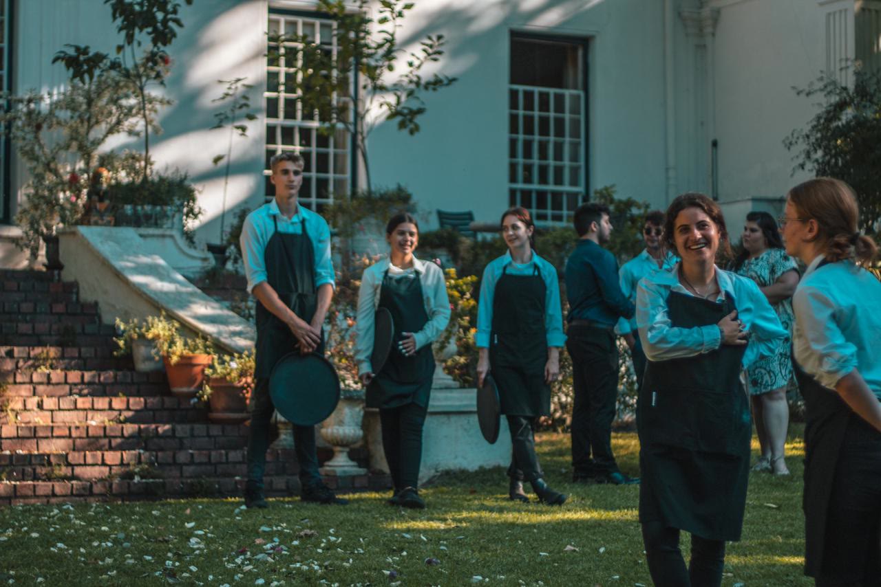 Silver Service floor team with trays at a Cape Town venue