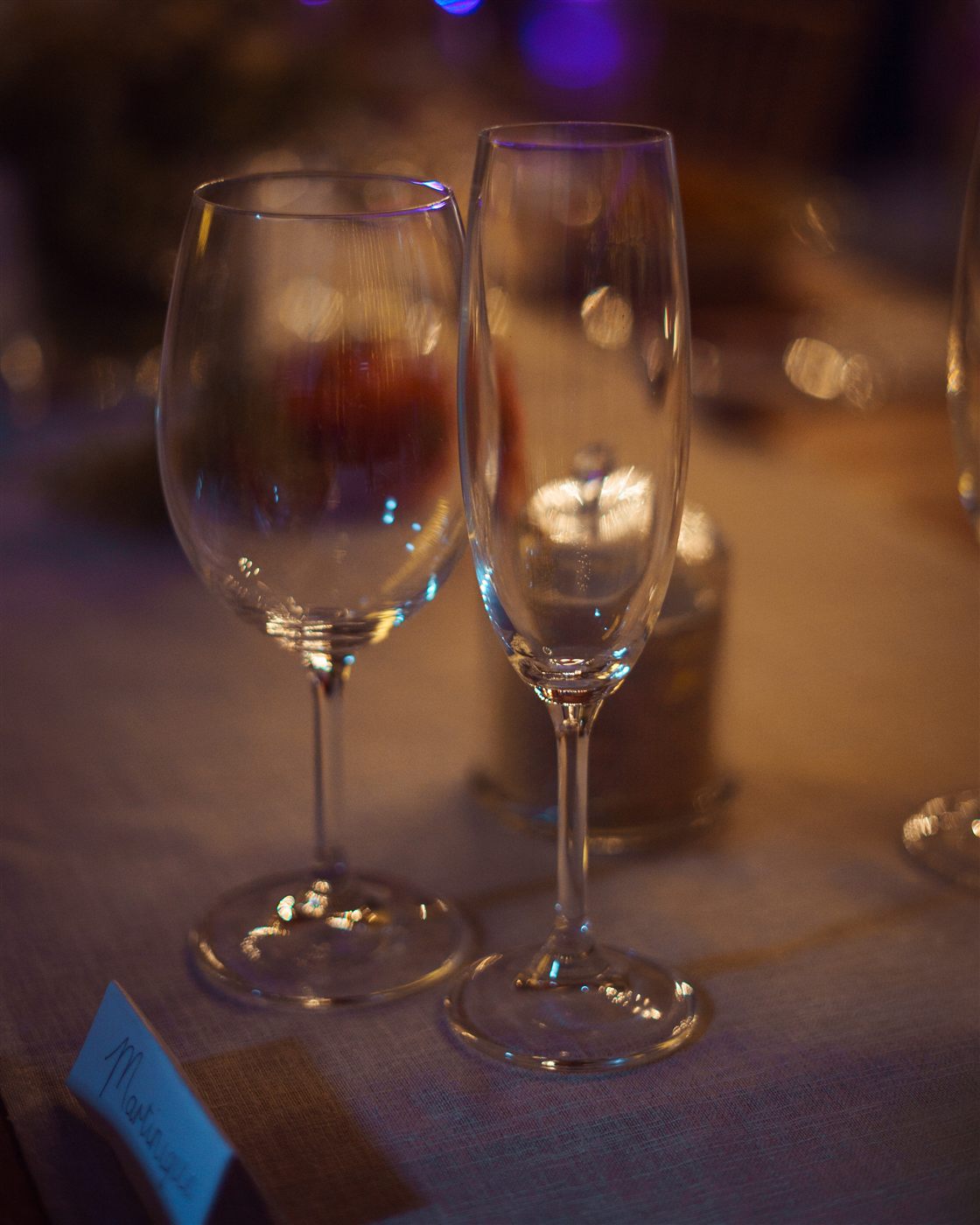Wine glass and champagne flute on a set wedding table