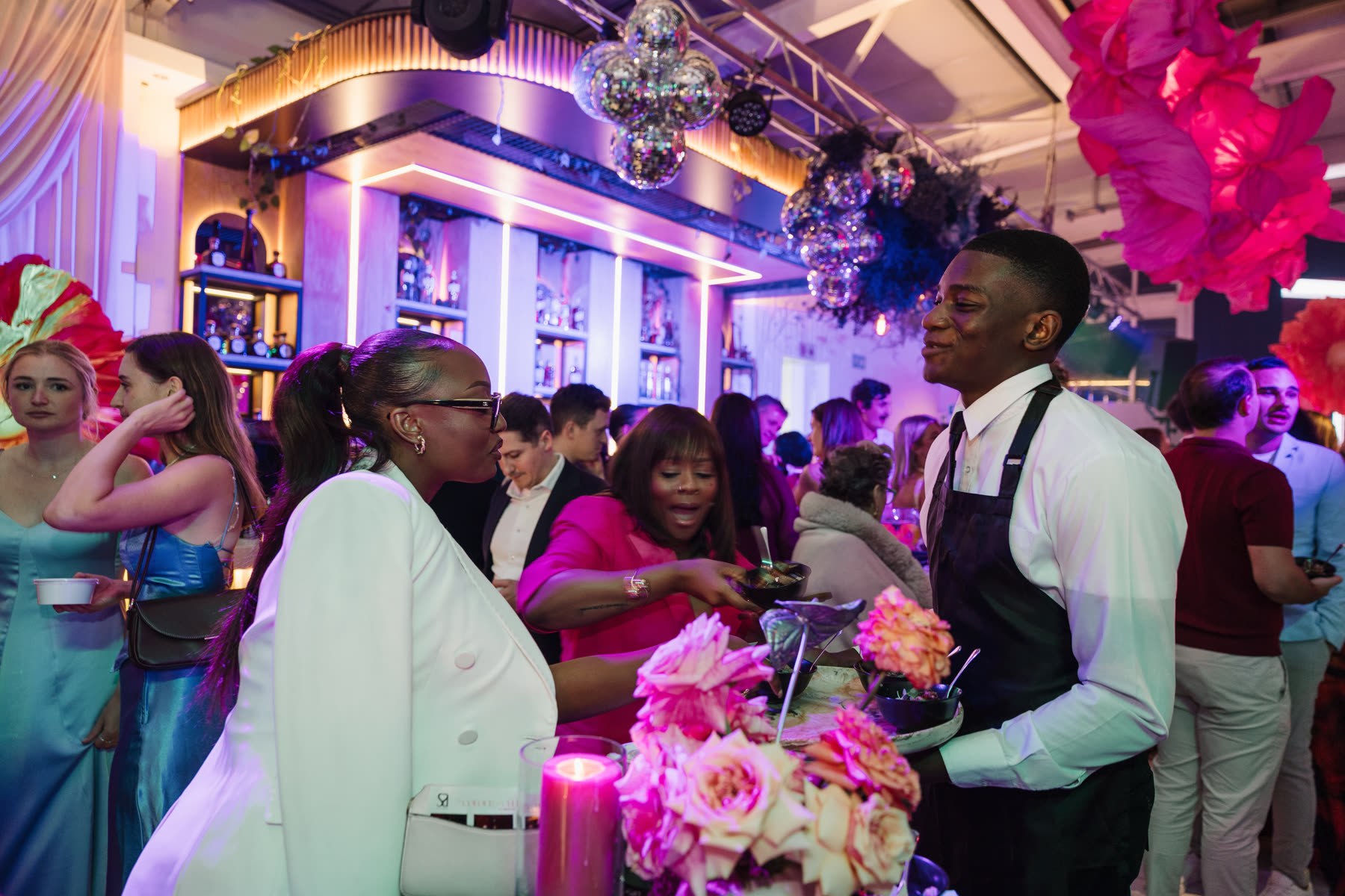 Silver Service waitron serving guests on the floor at a Cape Town event
